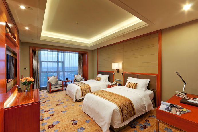 Imagen de la habitación del Hotel Empark Grand Hangzhou Bay Ningbo. Foto 9