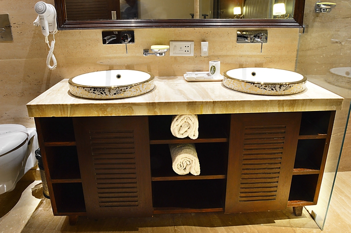 Imagen de la habitación del Hotel Emperor Palms At Karol Bagh. Foto 6