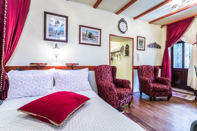 Imagen de la habitación del Hotel Emperor's Suites. Foto 2