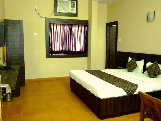 Imagen de la habitación del Hotel Empire Gandhidham. Foto 11