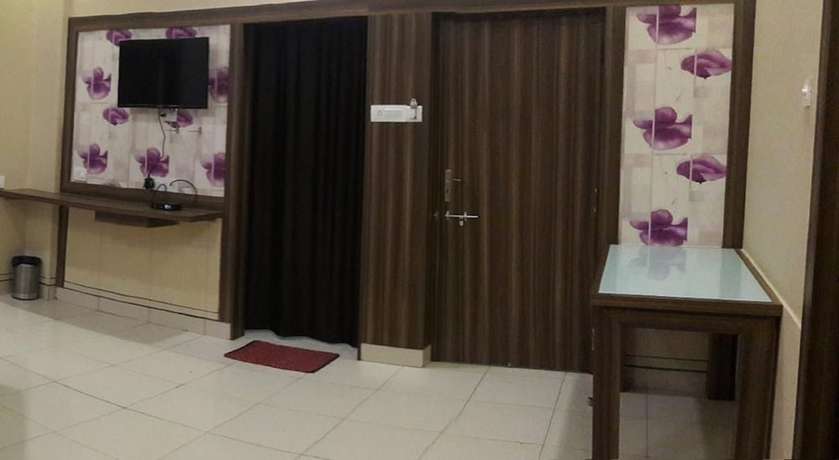 Imagen de la habitación del Hotel Empire Gandhidham. Foto 13