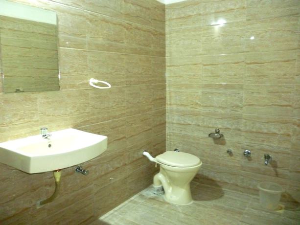 Imagen de la habitación del Hotel Empire Gandhidham. Foto 14