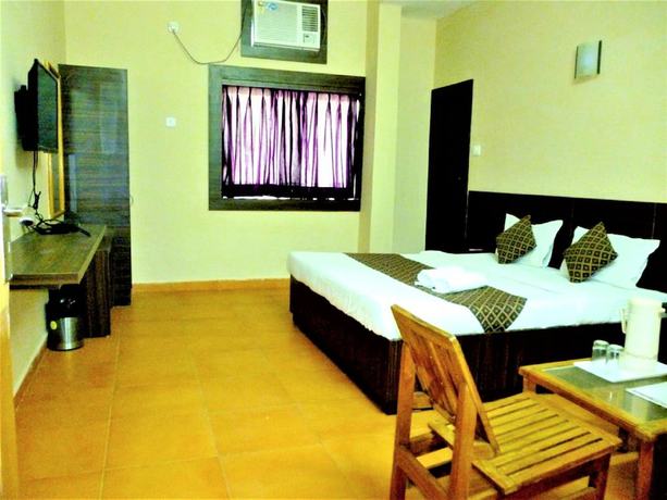Imagen de la habitación del Hotel Empire Gandhidham. Foto 15
