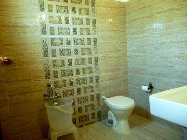 Imagen de la habitación del Hotel Empire Gandhidham. Foto 18
