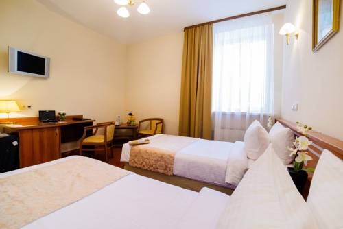 Imagen de la habitación del Hotel Empire Hotel. Foto 3