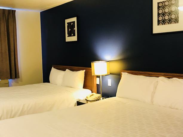 Imagen de la habitación del Hotel Empire Inn And Suites. Foto 2