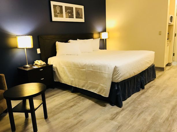 Imagen de la habitación del Hotel Empire Inn And Suites. Foto 11