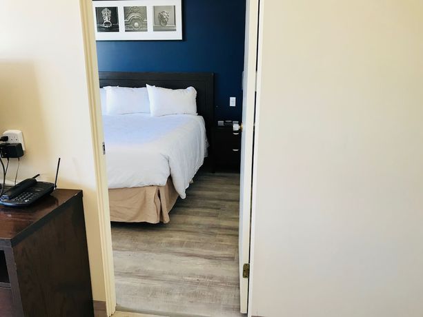 Imagen de la habitación del Hotel Empire Inn And Suites. Foto 15