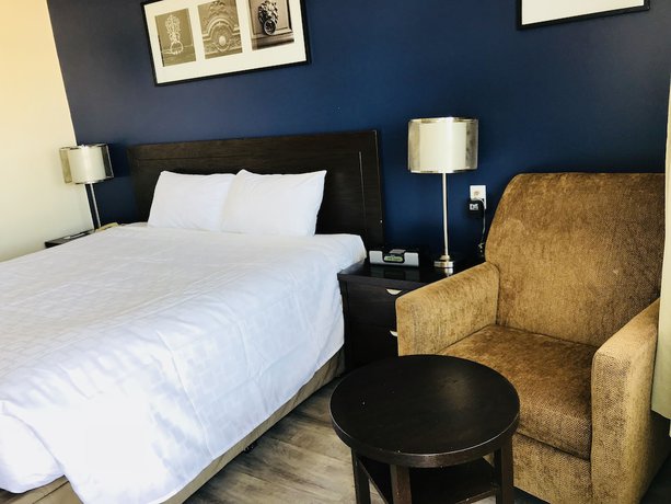 Imagen de la habitación del Hotel Empire Inn And Suites. Foto 18