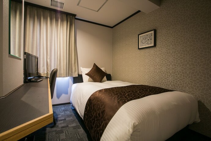 Imagen de la habitación del Hotel Empire Osaka. Foto 13