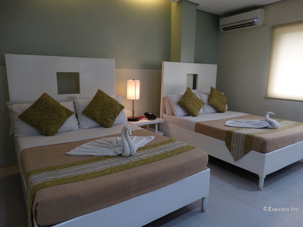 Imagen de la habitación del Hotel Empire Suites, Maningning. Foto 2