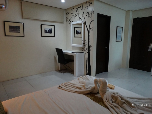 Imagen de la habitación del Hotel Empire Suites, Maningning. Foto 9