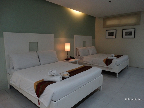 Imagen de la habitación del Hotel Empire Suites, Maningning. Foto 13