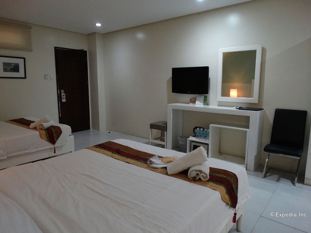 Imagen de la habitación del Hotel Empire Suites, Maningning. Foto 14