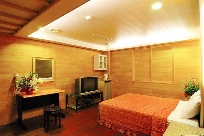 Imagen de la habitación del Hotel Empire, Taipei. Foto 12