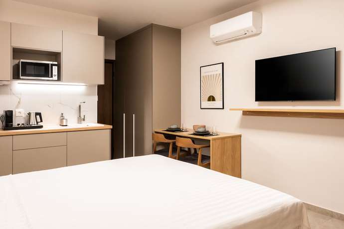 Imagen de la habitación del Hotel Empress Luxury Residences. Foto 11
