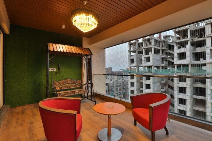 Imagen de la habitación del Hotel Empyrean, Gandhinagar. Foto 20