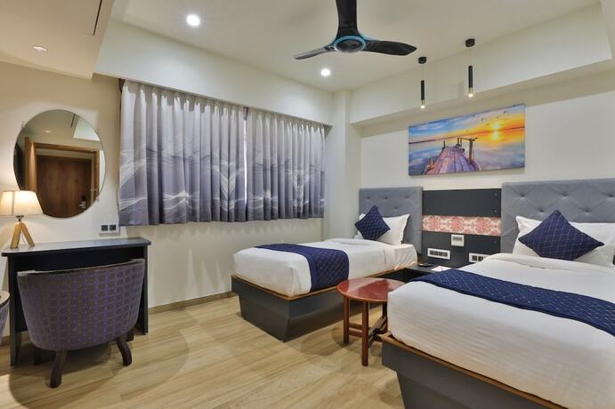 Imagen de la habitación del Hotel Empyrean, Gandhinagar. Foto 22