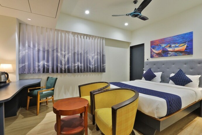Imagen de la habitación del Hotel Empyrean, Gandhinagar. Foto 23