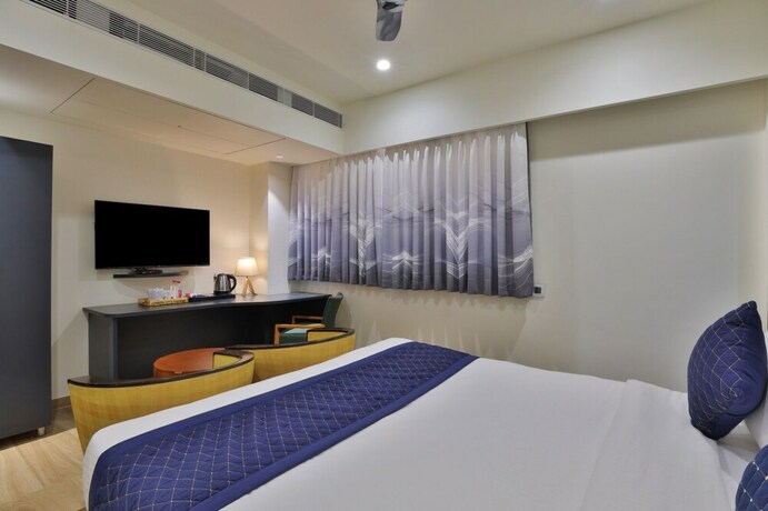 Imagen de la habitación del Hotel Empyrean, Gandhinagar. Foto 27
