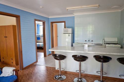 Imagen de la habitación del Hotel Emu Beach Chalets. Foto 3