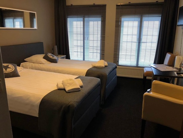 Imagen de la habitación del Hotel En Grand Caf&eacute; De Pauw. Foto 9