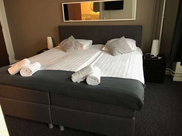 Imagen de la habitación del Hotel En Grand Caf&eacute; De Pauw. Foto 10