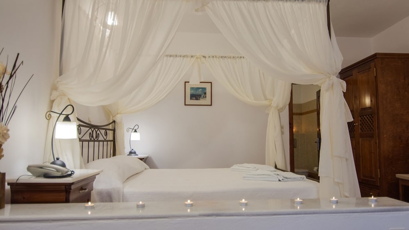 Imagen de la habitación del Hotel En Plo Boutique Suites. Foto 5