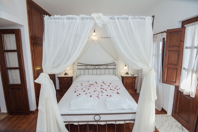 Imagen de la habitación del Hotel En Plo Boutique Suites. Foto 6