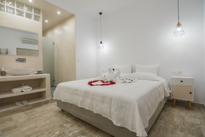 Imagen de la habitación del Hotel En Plo Boutique Suites. Foto 15