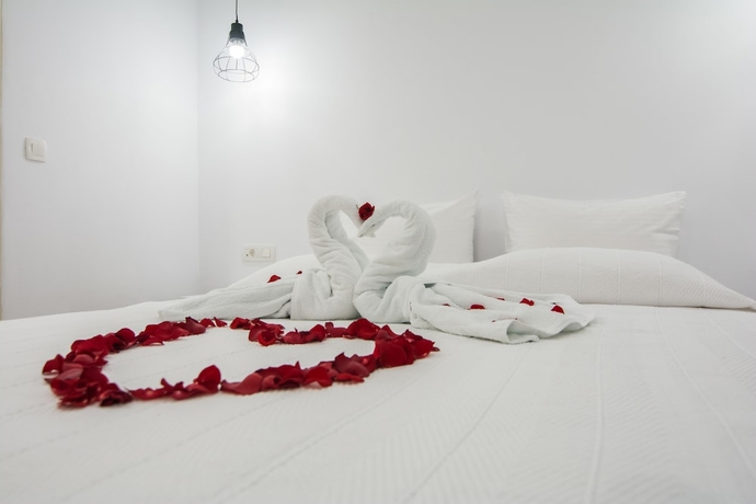 Imagen de la habitación del Hotel En Plo Boutique Suites. Foto 16