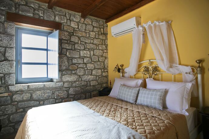 Imagen de la habitación del Hotel En Plo Luxury Suites. Foto 20