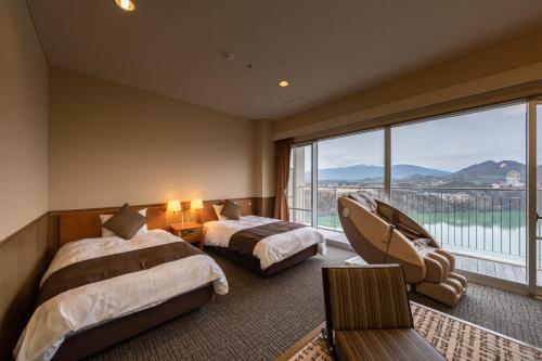 Imagen de la habitación del Hotel Enakyo Onsen Yuzuriha. Foto 14