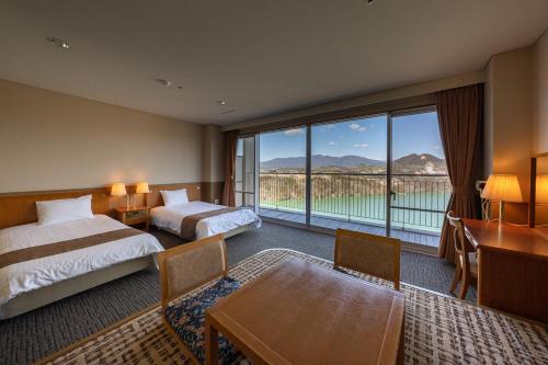 Imagen de la habitación del Hotel Enakyo Onsen Yuzuriha. Foto 15