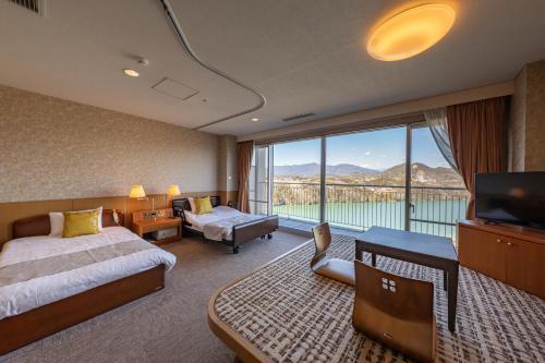 Imagen de la habitación del Hotel Enakyo Onsen Yuzuriha. Foto 16