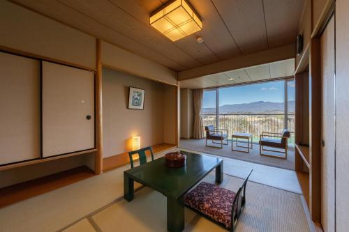 Imagen de la habitación del Hotel Enakyo Onsen Yuzuriha. Foto 19