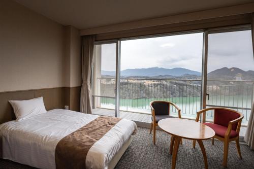 Imagen de la habitación del Hotel Enakyo Onsen Yuzuriha. Foto 20