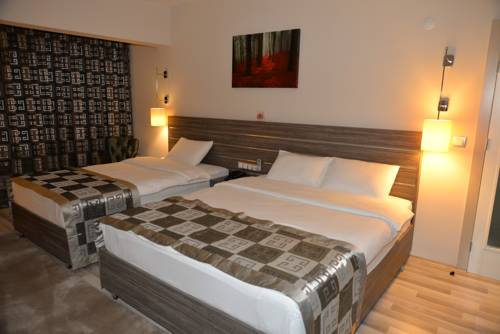 Imagen de la habitación del Hotel Enar. Foto 4