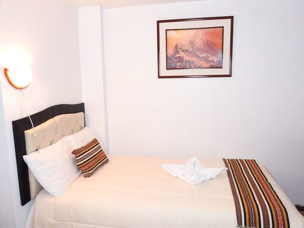Imagen de la habitación del Hotel Encanto Machu Picchu. Foto 10
