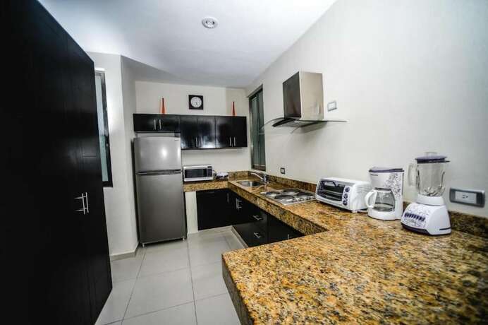 Imagen de la habitación del Hotel Encanto Riviera, Playa del Carmen. Foto 15
