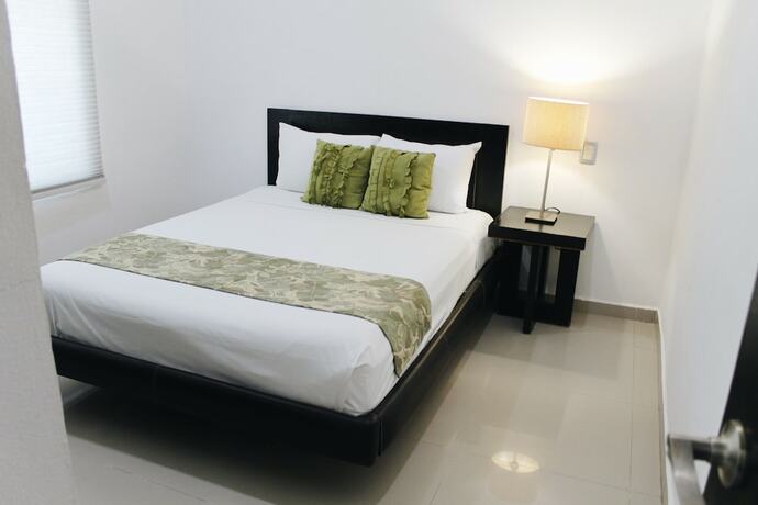Imagen de la habitación del Hotel Encanto Riviera, Playa del Carmen. Foto 16