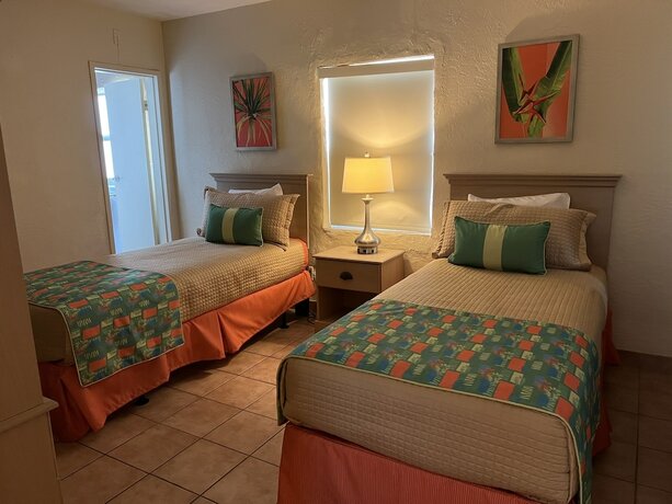 Imagen de la habitación del Hotel Enchanted Isle Resort. Foto 16