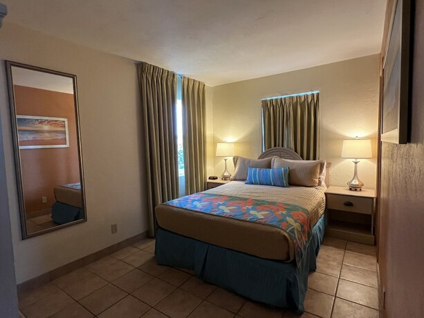 Imagen de la habitación del Hotel Enchanted Isle Resort. Foto 18