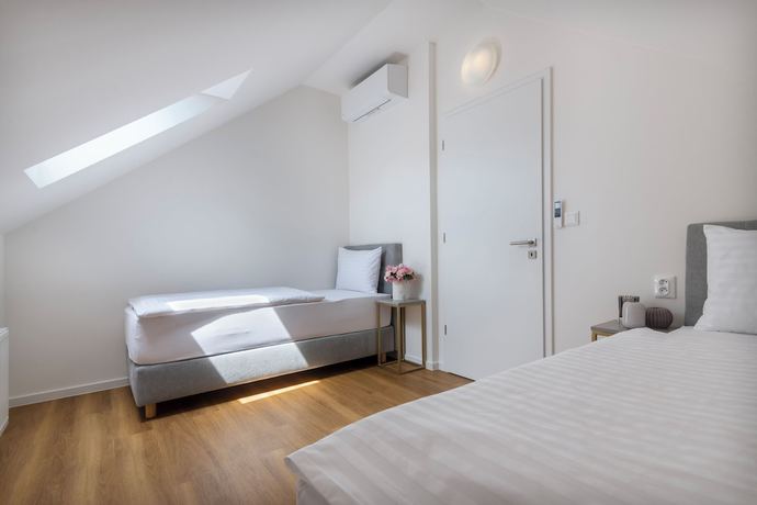 Imagen de la habitación del Hotel Encore Boutique Residence by Dwellfort. Foto 9