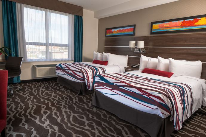 Imagen de la habitación del Hotel Encore Suites By Service Plus Inns. Foto 4