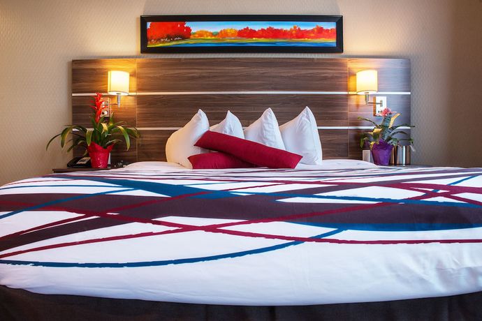 Imagen de la habitación del Hotel Encore Suites By Service Plus Inns. Foto 10
