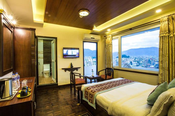 Imagen de la habitación del Hotel Encounter Nepal and Spa. Foto 11
