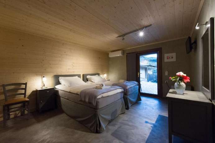 Imagen de la habitación del Hotel Enetiko Resort. Foto 11