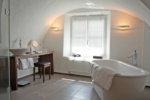 Imagen de la habitación del Hotel Engadiner Boutique-hotel Guardaval. Foto 5