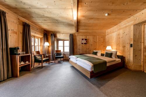 Imagen de la habitación del Hotel Engadiner Boutique-hotel Guardaval. Foto 6